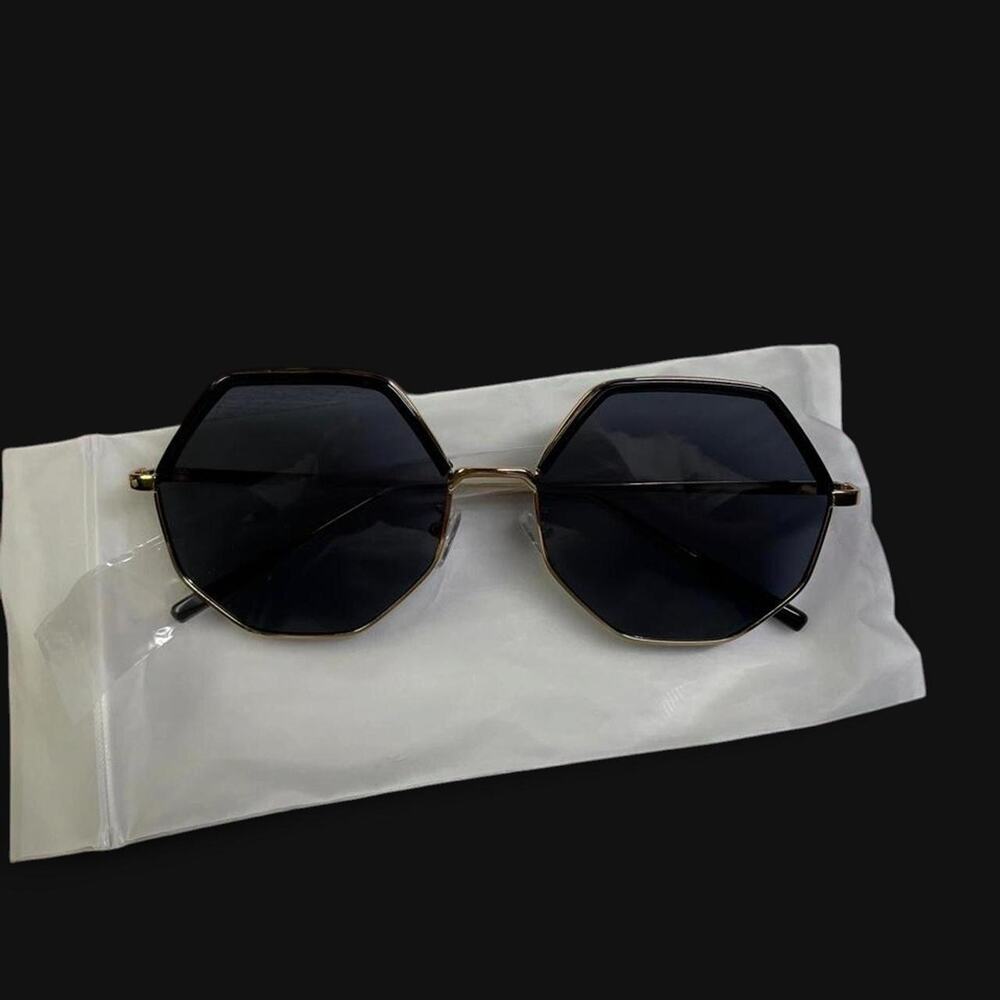 Black hexagonal sunglasses with gold frame